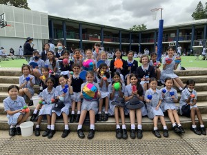 meriden students. meriden students on steps. meriden student leaders. student leadership at school.