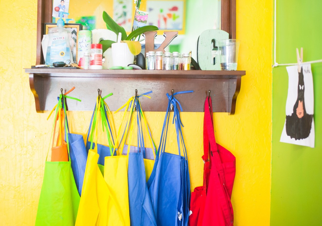 6 practical tips for moving schools. school bags hanging on wall.