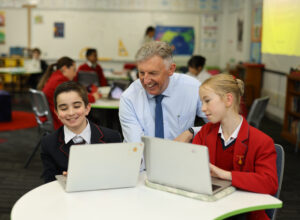 Peter Slattery And Junior School Students