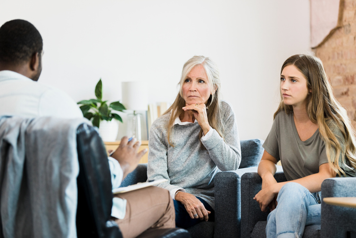 Mother And Daughter Attend Family Counseling Session