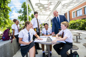 Director Of Boarding Tim Sedgwick With Students